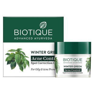 Крем від акне, прищів та постакне для жирної шкіри | Biotique Bio Winter Green Spot Correcting Anti-Acne Cream 15 г Wintergreen acne 15gm фото